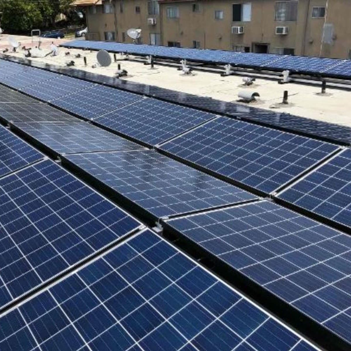Commercial solar array installed on a flat rooftop